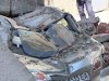 В Киеве бетонная стена обрушилась на припаркованный автомобиль