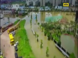 Потужні зливи затоплюють Китай