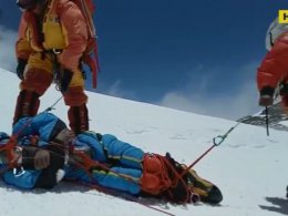 Безногий китайский альпинист-пенсионер покорил Эверест