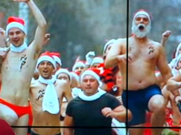 Голые и с песней: сотни Санта Клаусов пробежали по улицам Будапешта